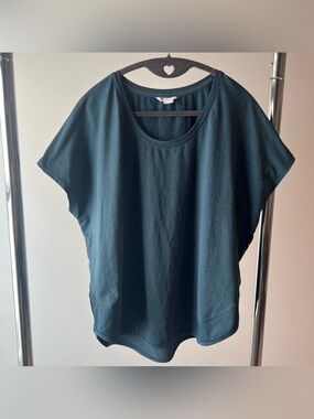 Well + Calm Size Large Cap Sleeve activewear top on Dark Teal GUC